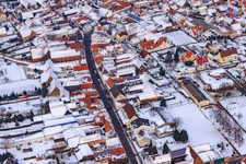 Aerial view of Kreuzgasse in the snow in Steinweiler in the state Rhineland-Palatinate, Germany