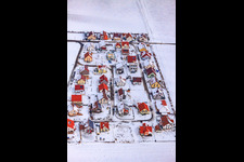 Aerial view of New development area Brotäcker in snow in Steinweiler in the state Rhineland-Palatinate, Germany