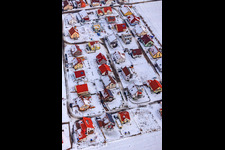 Oblique view of New development area Brotäcker in snow in Steinweiler in the state Rhineland-Palatinate, Germany