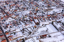 Kreuzgasse in the snow in Steinweiler in the state Rhineland-Palatinate, Germany seen from above