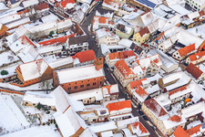 Protest. Church in the snow in Steinweiler in the state Rhineland-Palatinate, Germany from above