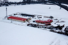 Chicken farm egg farm in winter with snow in Erlenbach bei Kandel in the state Rhineland-Palatinate, Germany