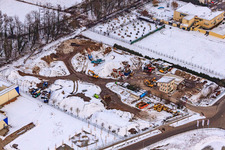 Aerial view of Construction waste recycling Gaudier earthworks and demolition in snow in the district Minderslachen in Kandel in the state Rhineland-Palatinate, Germany