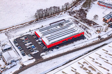 Aerial view of Bienwald Fitness World in the snow in the district Minderslachen in Kandel in the state Rhineland-Palatinate, Germany