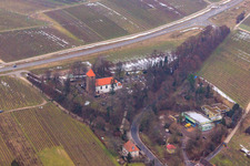 Protest. Church and cemetery in snow in the district Wollmesheim in Landau in der Pfalz in the state Rhineland-Palatinate, Germany