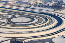 Oblique view of Oberwald industrial area, Daimler truck test track in winter with snow in Wörth am Rhein in the state Rhineland-Palatinate, Germany