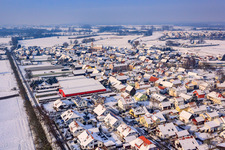Aerial view of At Otterbach in winter with snow in Neupotz in the state Rhineland-Palatinate, Germany