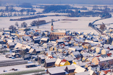 Town center in winter with snow in Neupotz in the state Rhineland-Palatinate, Germany