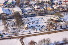 Aerial view of Cemetery in winter with snow in Neupotz in the state Rhineland-Palatinate, Germany