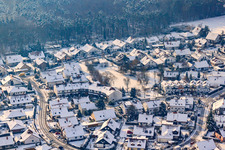 Oblique view of At clay pits in winter with snow in Rheinzabern in the state Rhineland-Palatinate, Germany