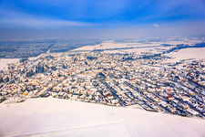 Aerial view of View of the town from the south in winter with snow in Rheinzabern in the state Rhineland-Palatinate, Germany