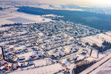 Aerial view of New development area in the clay pits from the northwest in winter with snow in Rheinzabern in the state Rhineland-Palatinate, Germany