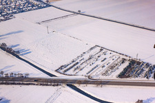 Course of the Erlenbach in winter with snow in Hatzenbühl in the state Rhineland-Palatinate, Germany