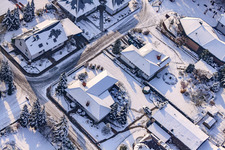 Oblique view of Industrial road in winter with snow in Rheinzabern in the state Rhineland-Palatinate, Germany