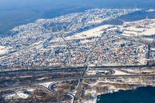 Aerial view of City view from the southeast in winter with snow in Wörth am Rhein in the state Rhineland-Palatinate, Germany