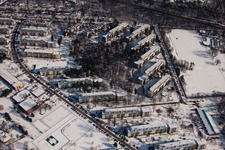 Tennesseeallee in winter with snow in the district Nordstadt in Karlsruhe in the state Baden-Wuerttemberg, Germany