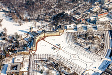 Oblique view of Wintry snowy Building complex in the park of the castle Schloss Karlsruhe in Karlsruhe in the state Baden-Wurttemberg, Germany