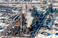Aerial view of Wintry snowy Refinery equipment and management systems on the factory premises of the mineral oil manufacturers Mineraloelraffinerie Oberrhein in the district Knielingen in Karlsruhe in the state Baden-Wurttemberg, Germany