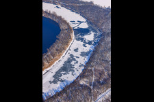 Aerial view of Frozen Althrein Kleiner Bodensee in winter with snow in the district Neureut in Karlsruhe in the state Baden-Wuerttemberg, Germany