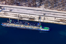 Oil port in winter with snow in the district Knielingen in Karlsruhe in the state Baden-Wuerttemberg, Germany