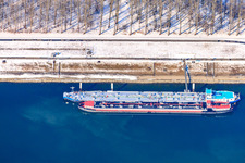 Aerial view of Oil port in winter with snow in the district Knielingen in Karlsruhe in the state Baden-Wuerttemberg, Germany
