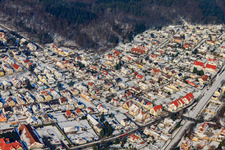 Hatzenbühler Straße in winter with snow in Jockgrim in the state Rhineland-Palatinate, Germany