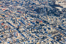 Marienstraße in winter with snow in Jockgrim in the state Rhineland-Palatinate, Germany