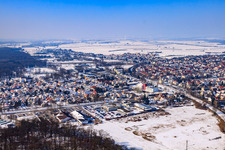 City view with railway line from the southeast in winter with snow in Kandel in the state Rhineland-Palatinate, Germany