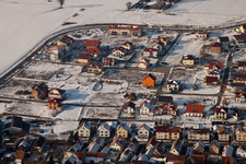On the high trail in winter with snow in Kandel in the state Rhineland-Palatinate, Germany from the plane