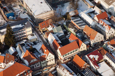 Aerial view of Schulgasse x Hauptstraße in winter with snow in Kandel in the state Rhineland-Palatinate, Germany