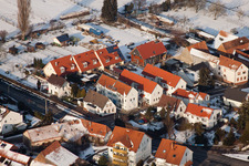 Aerial view of Brehmstr in winter with snow in the district Minderslachen in Kandel in the state Rhineland-Palatinate, Germany