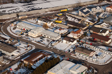 Barthelsmühlring in the Horst industrial estate in winter with snow in the district Minderslachen in Kandel in the state Rhineland-Palatinate, Germany
