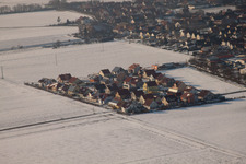 New development area Brotäcker in winter with snow in Steinweiler in the state Rhineland-Palatinate, Germany