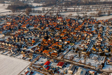 Winter snow-covered village view in Steinweiler in the state Rhineland-Palatinate, Germany