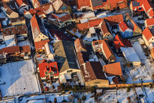 Aerial photograpy of Haselschußgasse in snow in Steinweiler in the state Rhineland-Palatinate, Germany
