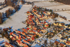 Aerial view of Niedergasse in the snow in Steinweiler in the state Rhineland-Palatinate, Germany