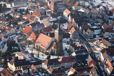 Evangelical St. Martin's Church in winter with snow in the district Billigheim in Billigheim-Ingenheim in the state Rhineland-Palatinate, Germany