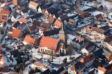 Aerial photograpy of Wintry snowy Town View of the streets and houses of the residential areas in the district Ingenheim in Billigheim-Ingenheim in the state Rhineland-Palatinate