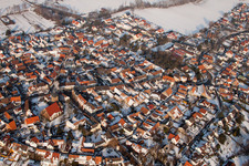 Wintry snowy Town View of the streets and houses of the residential areas in Billigheim-Ingenheim in the state Rhineland-Palatinate
