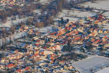 From the southwest in winter when there is snow in the district Mühlhofen in Billigheim-Ingenheim in the state Rhineland-Palatinate, Germany