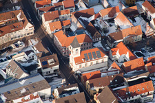 Wintry snowy Town View of the streets and houses of the residential areas in the district Ingenheim in Billigheim-Ingenheim in the state Rhineland-Palatinate from the plane