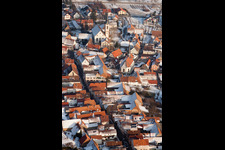 Winter snow-covered village view in Göcklingen in the state Rhineland-Palatinate, Germany seen from above