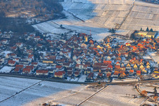 Wine village from the southeast in winter with snow in Eschbach in the state Rhineland-Palatinate, Germany