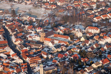 Winter snow-covered village in Klingenmünster in the state Rhineland-Palatinate, Germany