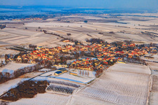 Village view from the west in winter with snow in Dierbach in the state Rhineland-Palatinate, Germany