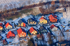 Aerial view of Kirchgasse in winter with snow in Dierbach in the state Rhineland-Palatinate, Germany