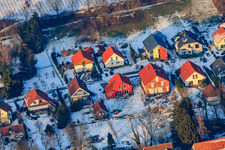 Aerial photograpy of Kirchgasse in winter with snow in Dierbach in the state Rhineland-Palatinate, Germany