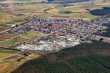 Aerial view of View of the town from the northeast with the industrial area at the train station in the district Friedrichstal in Stutensee in the state Baden-Wuerttemberg, Germany