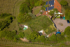 Bioland winegrowing under the grass roof Marzolph winery in the district Wollmesheim in Landau in der Pfalz in the state Rhineland-Palatinate, Germany from a drone