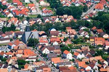 Lower main street to church in Leimersheim in the state Rhineland-Palatinate, Germany